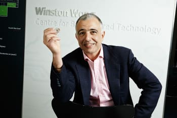 Imperial College London Professor Christofer Toumazou with his Genealysis chip, which can analyze DNA within 30 minutes and without a laboratory. The chip is powered by a mechanism that uses biology input from DNA to run analysis. The patented mechanism is now nominated for a 2014 European Patent Office Inventor Award.