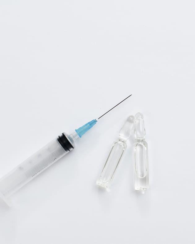 Covid Treatment | Image of Vaccine and Needles