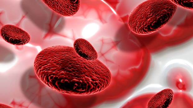 3D render of blood cells on abstract background